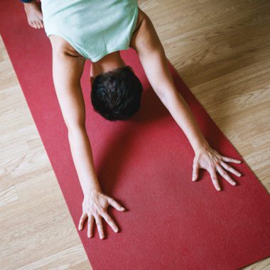 Individual in Dog Down Pose